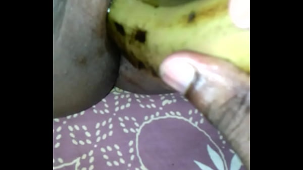 Tamil girl play with banana