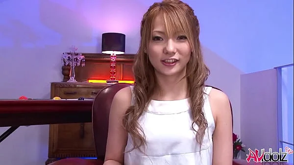 Horny Japanese woman Sena Aragaki plays with a sex toy on a armcair,uncensored.