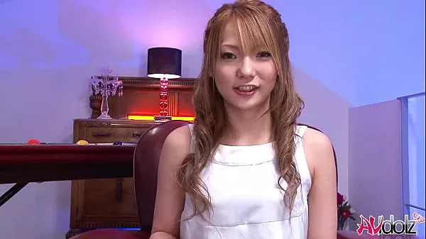 Horny Japanese woman Sena Aragaki plays with a sex toy on a armcair,uncensored.