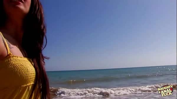 Big ass brunette gets horny and the beach and decides to suck his fat cock.