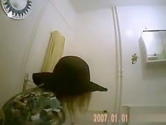 Blonde uses her toilet and wipes clean