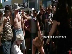 Group of sluts undressed in public on the streets and spanked and  in rough torture