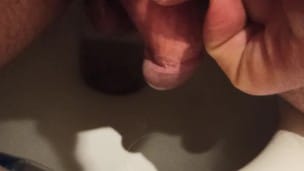 I pee and stroke my dickhead.