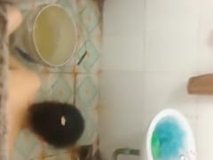 Kinky bathroom image with a hairy woman