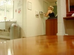 Pretty blonde takes a piss into the nylon bag