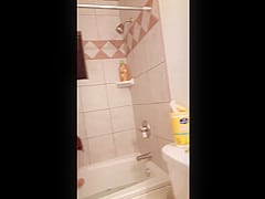 Wife cleans tub in the nude