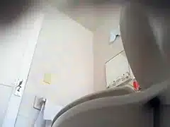 Cute maid piddles on a