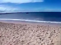 Desirable dish lets her man put sunscreen on her slim body