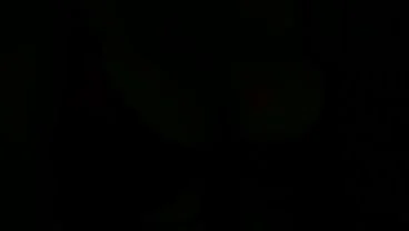 Fucking her ginormous titties with his white cock makes her grin with a devious smile…