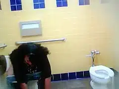 Lovely Brazilian fattie gets recorded urinating hard in a public restroom