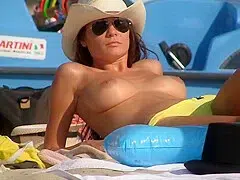 sweet busty brunette on the beach