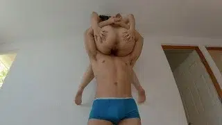 The spider girl climbs on the wall to receive oral sex