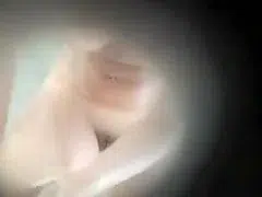 Woman gets spied on while taking a quick shower