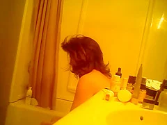 My aunty scratches herself in the bathroom