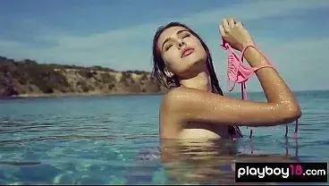 Skinny naked teen Katrina Pirs reveals her sweaty sun kissed pussy at beach