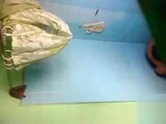 Young Latina gets clean in the bathtub