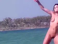 Girls Playing Games at the Nude Beach