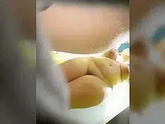 mature woman in pool cabin