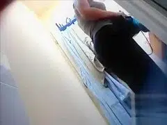 Tanned girl gets ready for work