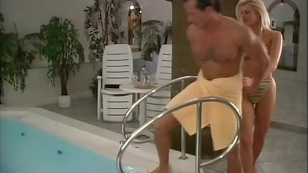 This blonde slut loves giving blowjobs and fucking in the pool