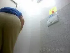 Old lady pees and wipes in public bathroom