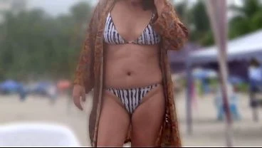 My stepson films me on the beach putting on a bikini, showing off, and even masturbating.