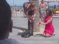Petite babe lets mistress disgrace her in public