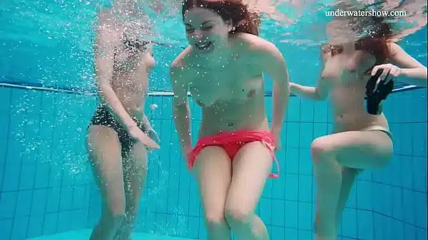 Underwater naked threesome of lesbians